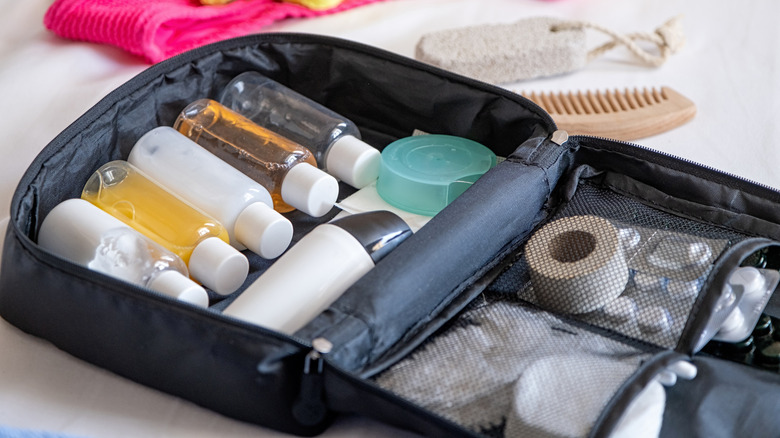 Travel cosmetics and toiletries in a packing case