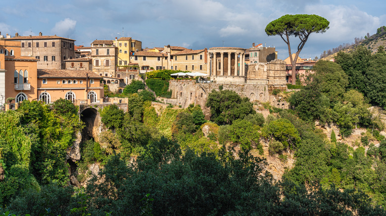 View over the scenic Villa Gregoriana and Temple of Vesta in Tivoli in Italy