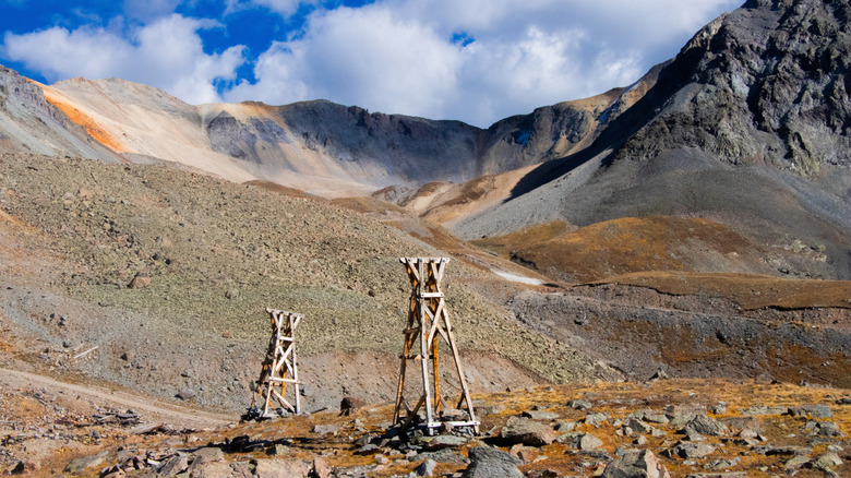 Abandoned mining equipment at the top of a mountain in Colorado's Tomboy ghost town.