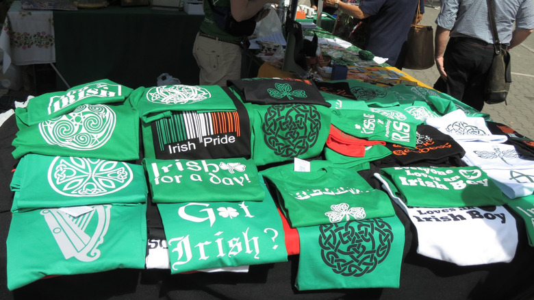 St. Patrick's Day themed t-shirts in a market