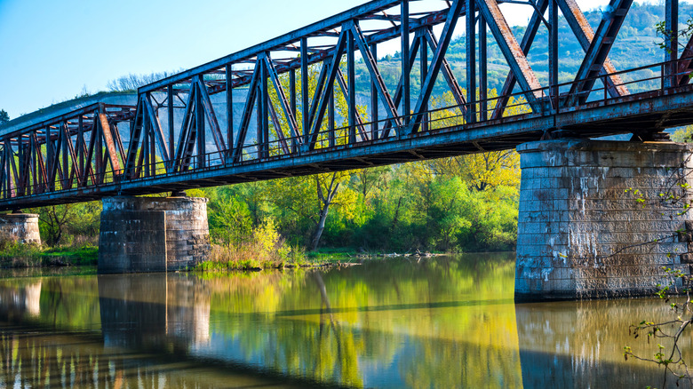 Steel railroad bridge on the river