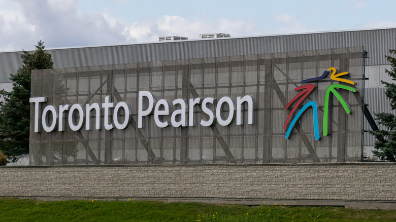 A large sign with Toronto Pearson airport logo