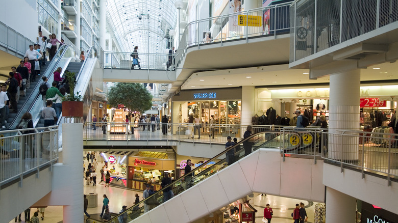 Inside a large shopping mall with multiple levels