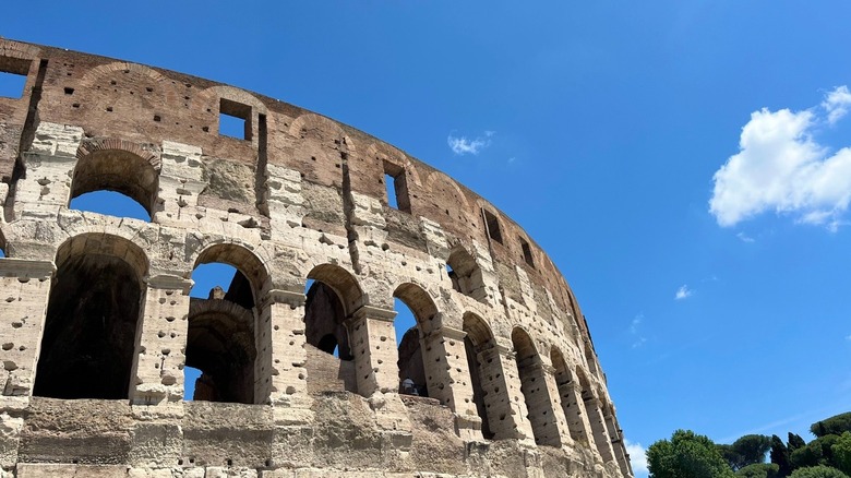 The Colosseum in Rome against clear blue skies
