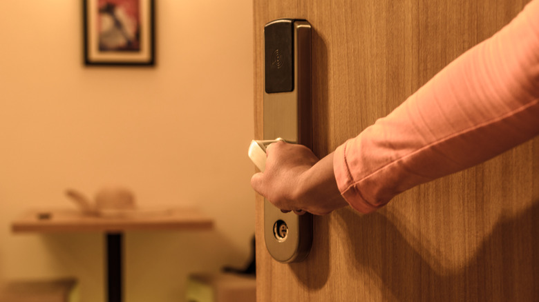 Opening hotel room door
