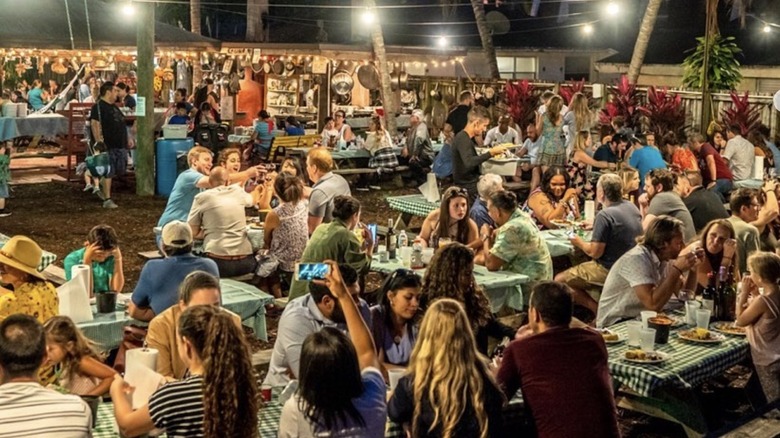 Diners share communal tables at Regina's Farm