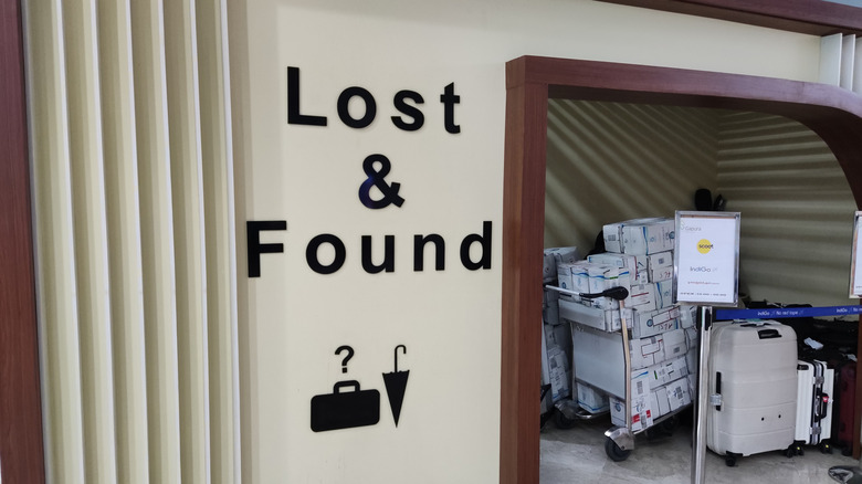 The Lost and Found section of an airport with lost boxes and suitcases