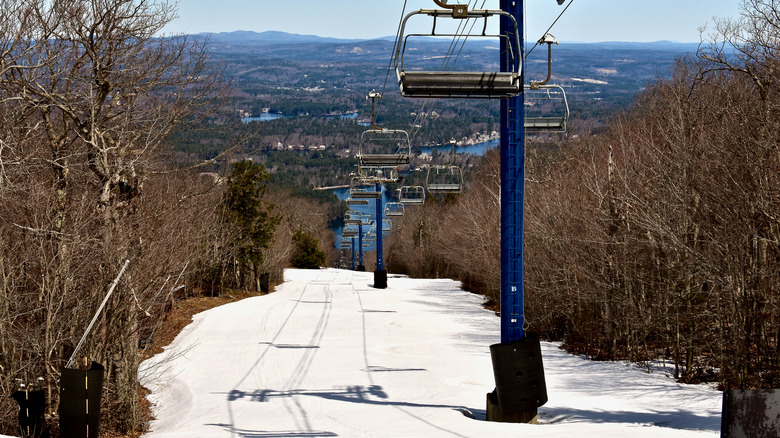 A chair lift on a snow-covered trail at Wachusett Mountain Ski Area in Princeton, Massachusetts.