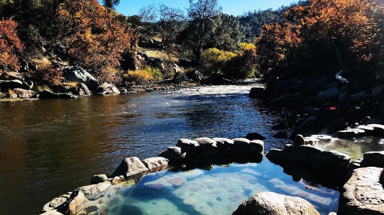 The Kern River flows past soaking tubs at Remington Hot Springs, California