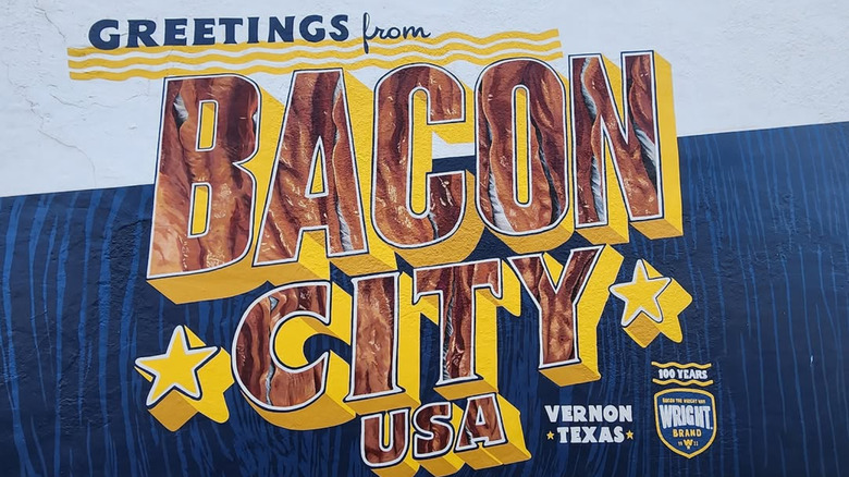 Red letters on blue-and-white backdrop