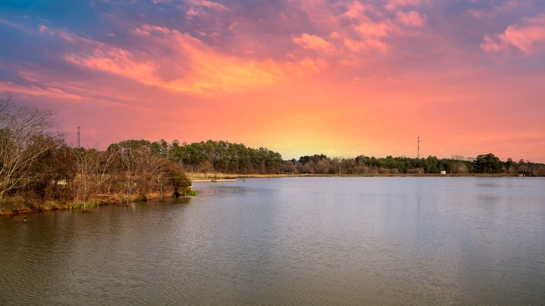View of lake at sunset in Rhodes Jordan Park in Lawrenceville