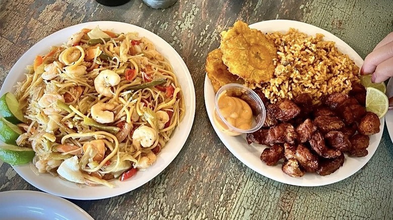 Culture Cuisine's pancit, manoknok, rice, and tostones on two plates