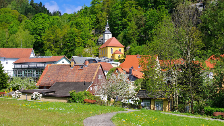 Germany's Oybin Church and village in spring surrounded by lush greenery