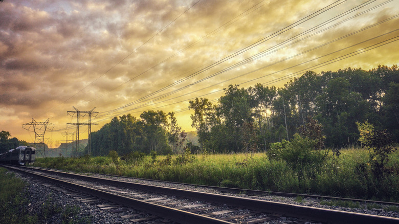 Sunrise in Brecksville Ohio behind a train