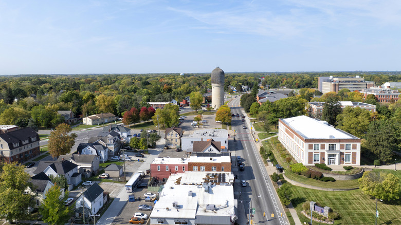 An aerial view of Ypsilanti, Michigan, showing a water towel and several buildings