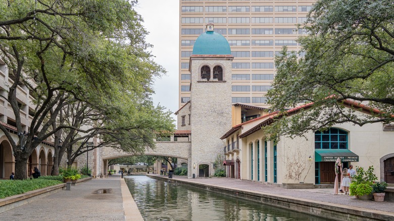 The Mandalay Canal Walk at Las Colinas, featuring white stone buildings
