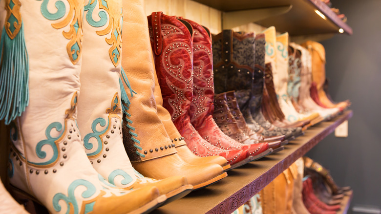 Cowboy boots on shelf in store