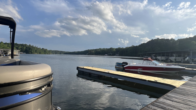 boats in the water by the dock at Smith Lake