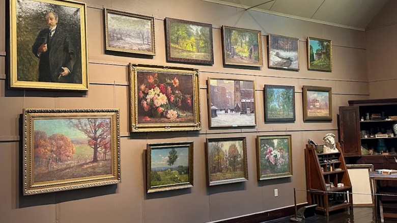 A view of T.C. Steele's paintings inside the Large Studio