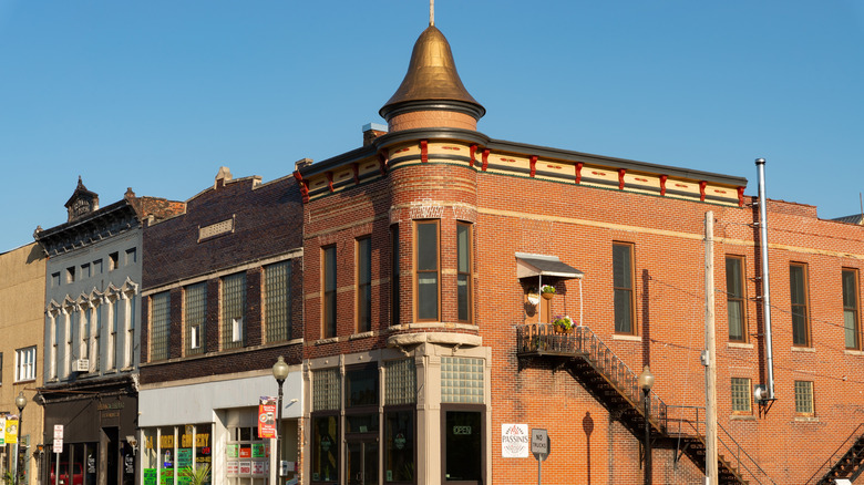 Brick building with bell in downtown Peru, Illinois
