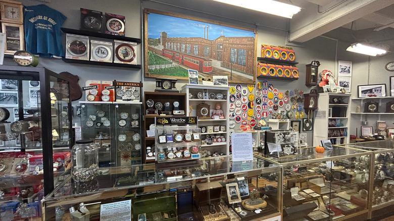 An image of display cases of clocks and watches in the Westclox Museum in Peru, Illinois