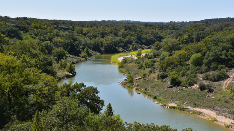 A river running through Milton Reimers Ranch Park, Texas