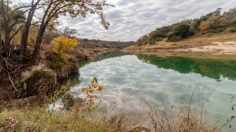 View from the bank of the Pedernales River in Milton Reimers Ranch Park, Texas