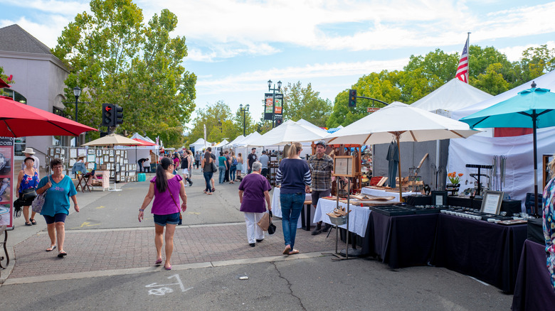 People strolling among market stalls, Lafayette Art & Wine Festival