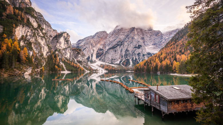 Boats floating on the Lago di Braies in the Dolomites