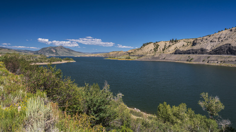 The Green Mountain Reservoir is fed by the Blue River from the south and drains into the same river in the north. The Blue River joins the Colorado River a few miles north of the reservoir. The reservoir provides recreational opportunities for boating and fishing as well as a natural habitat for wildlife.