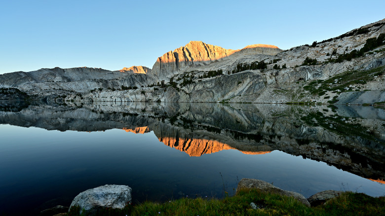 A morning shot of Steelhead Lake with its water refllecting off of it.