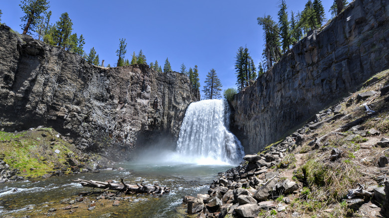 Rainbow Falls California from below misty water volcanic cliffs