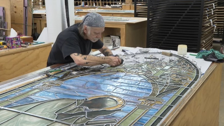 Artist at stained glass studio in New Berlin, Wisconsin