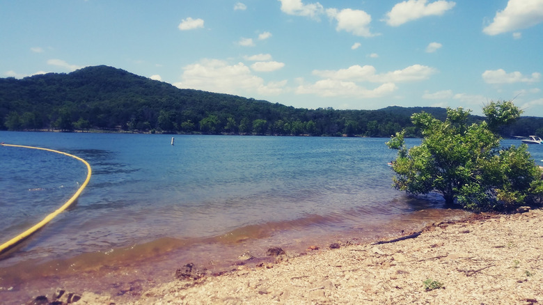 The beach with views of the Ozark Mountain in Aunts Creek Park along Table Rock Lake outside of Branson, Missouri