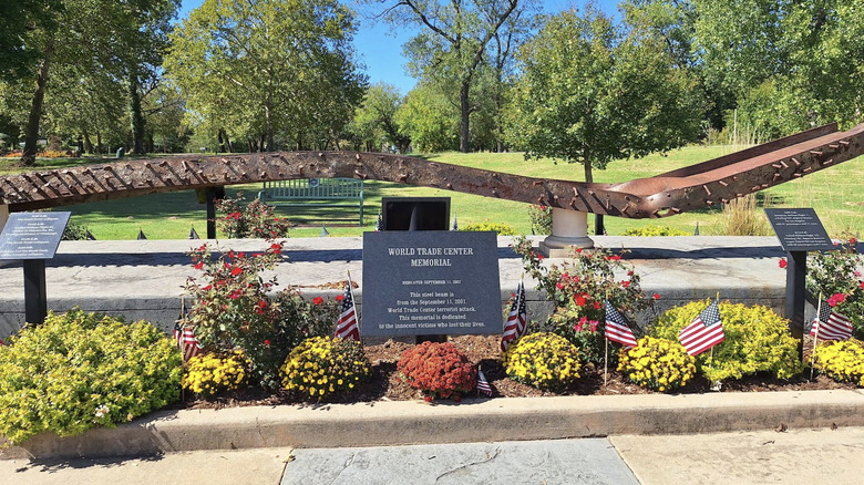 A memorial plaque and shrubs in Washington Irving Memorial Park and Arboretum