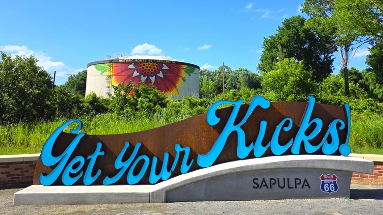 Get Your Kicks sign and sunflower water tower near historic Route 66 bridge in Sapulpa, Oklahoma