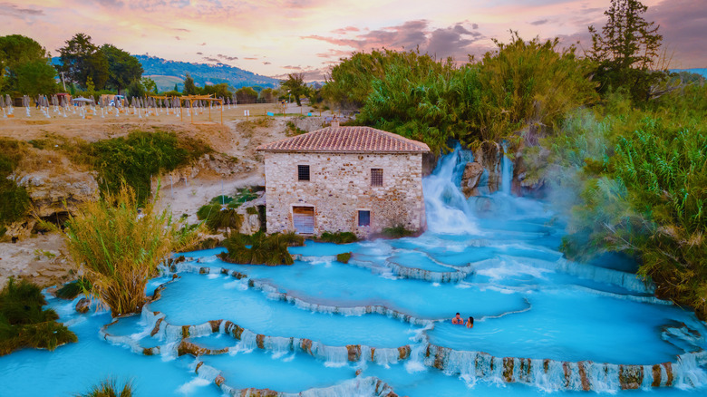 Cascate del Mulino hot springs in Saturnia, Italy during sunset