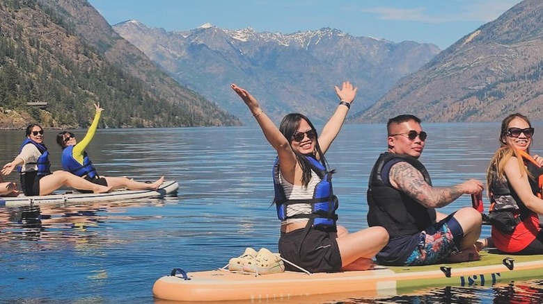 Paddleboarding campers at Twenty-Five Mile Creek State Park on Lake Chelan