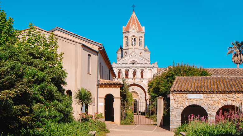 Historic monastery with tall ornate bell tower on Île Saint-Honorat