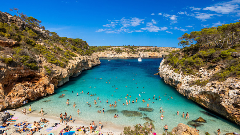 People swimming on the beach in Mallorca, Spain