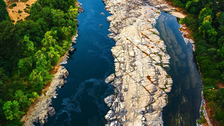 View of the lower Umpqua River, with stunning rocky banks and clear water