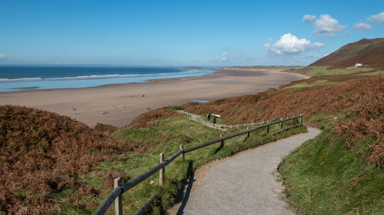 Path winding down to Rhossili Bay Beach in Wales