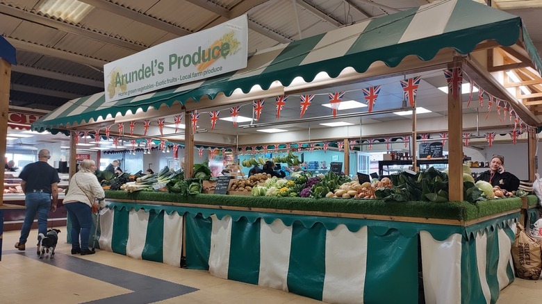 Fresh produce stall at Freeman Street Market indoors