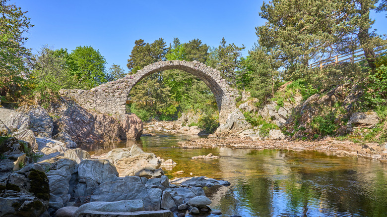 The stone Old Pack Horse Bridge over the River Dulnain