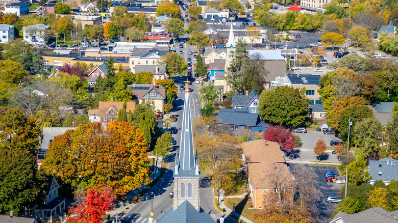 An arial view of Downtown Cedarburg's churches, shops, and restaurants in fall