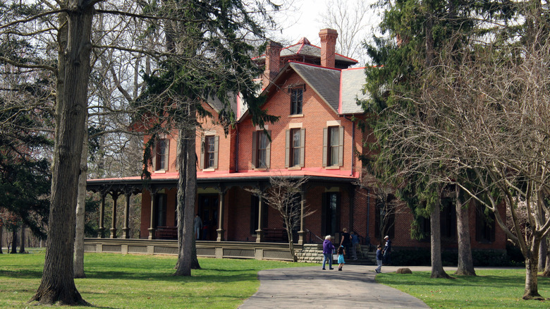 Exterior of of Rutherford B. Hayes' home surrounded by trees at Spiegel Grove in Ohio