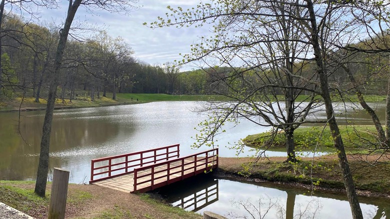 A small footbridge crossing Caldwell Lake in Scioto Trail State Park, Ohio