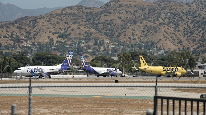Airplanes parked on the tarmac at Burbank Airport in Burbank, California