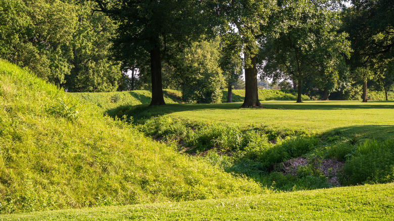 A grassy trench and mounds at the Newark Earthworks in Ohio