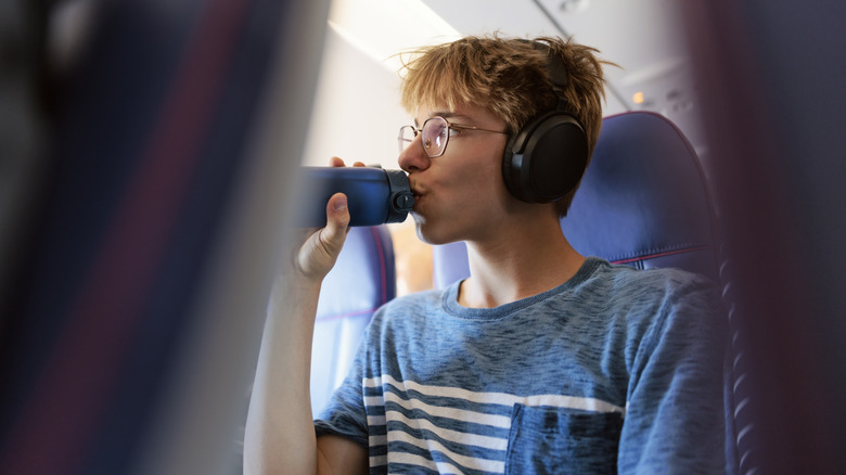 Drinking water on plane
